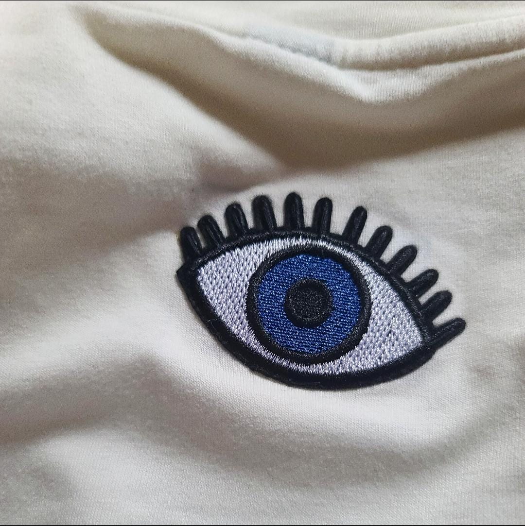 evil eye puff logo- flowy cropped tee